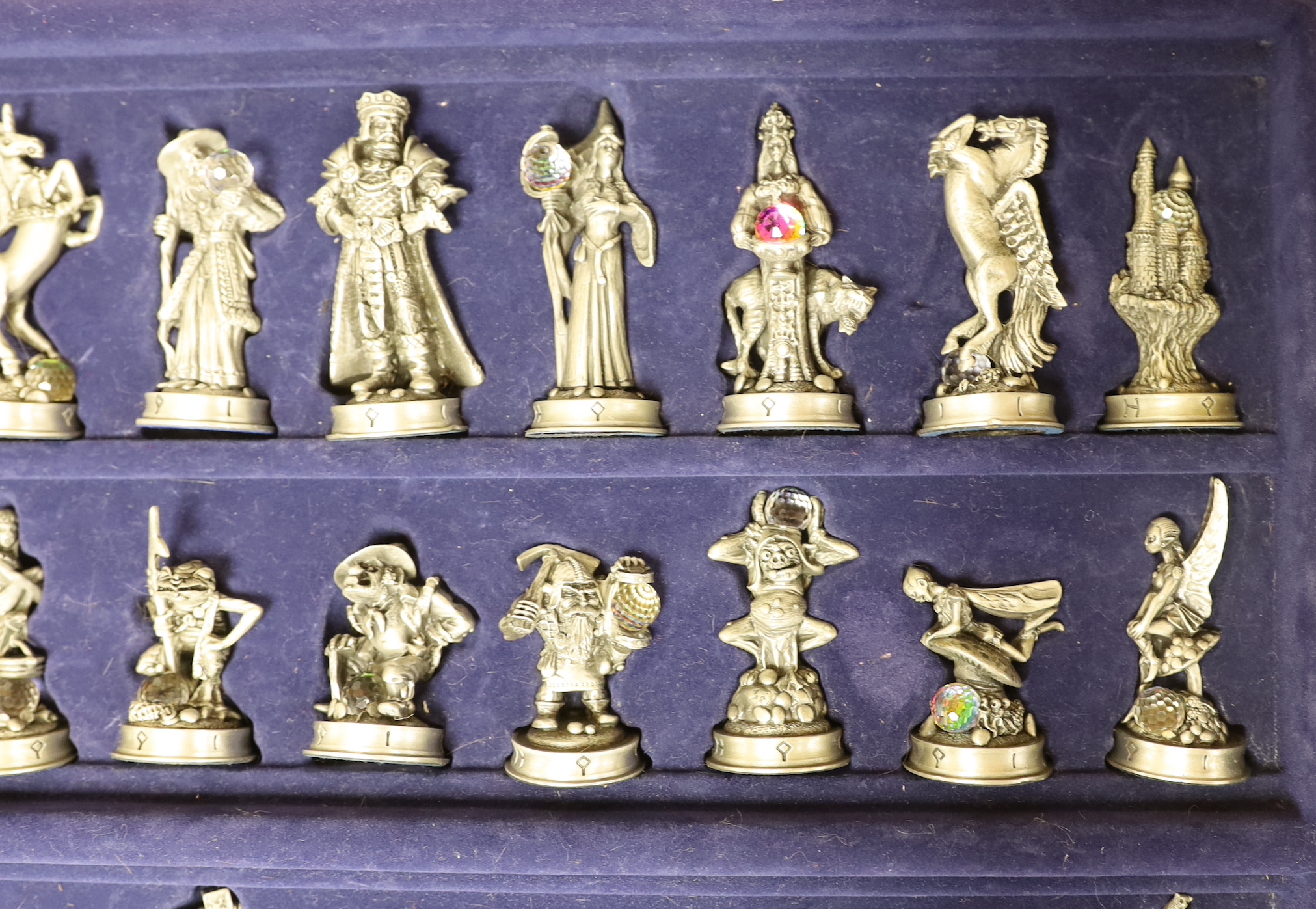 The Fantasy of the Crystal chess set and board with booklet and certificate of authenticity numbered 0598, the largest piece 8.5cm high